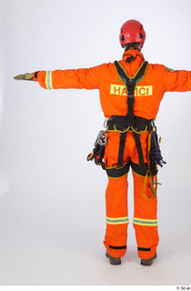 Photos Sam Atkins Fireman in Orange Coveralls standing t poses…